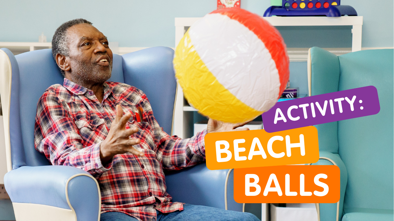 An older man catches a beach ball as it comes towards him. words read: activity beach balls